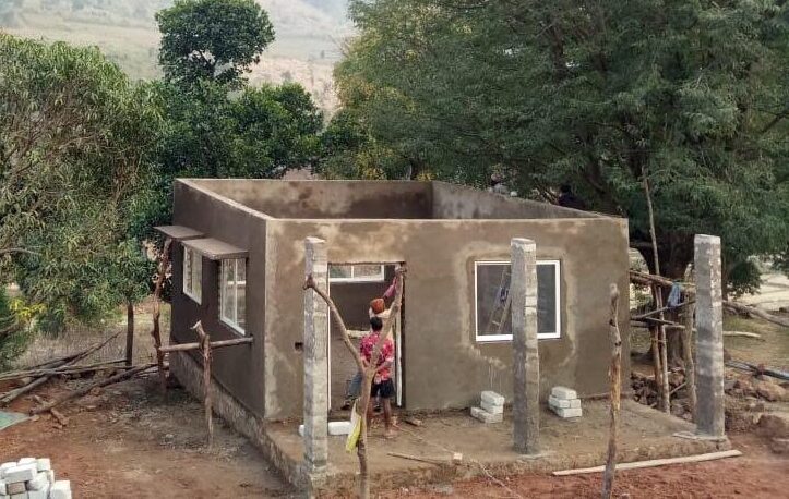 Walls rising from the ground during construction