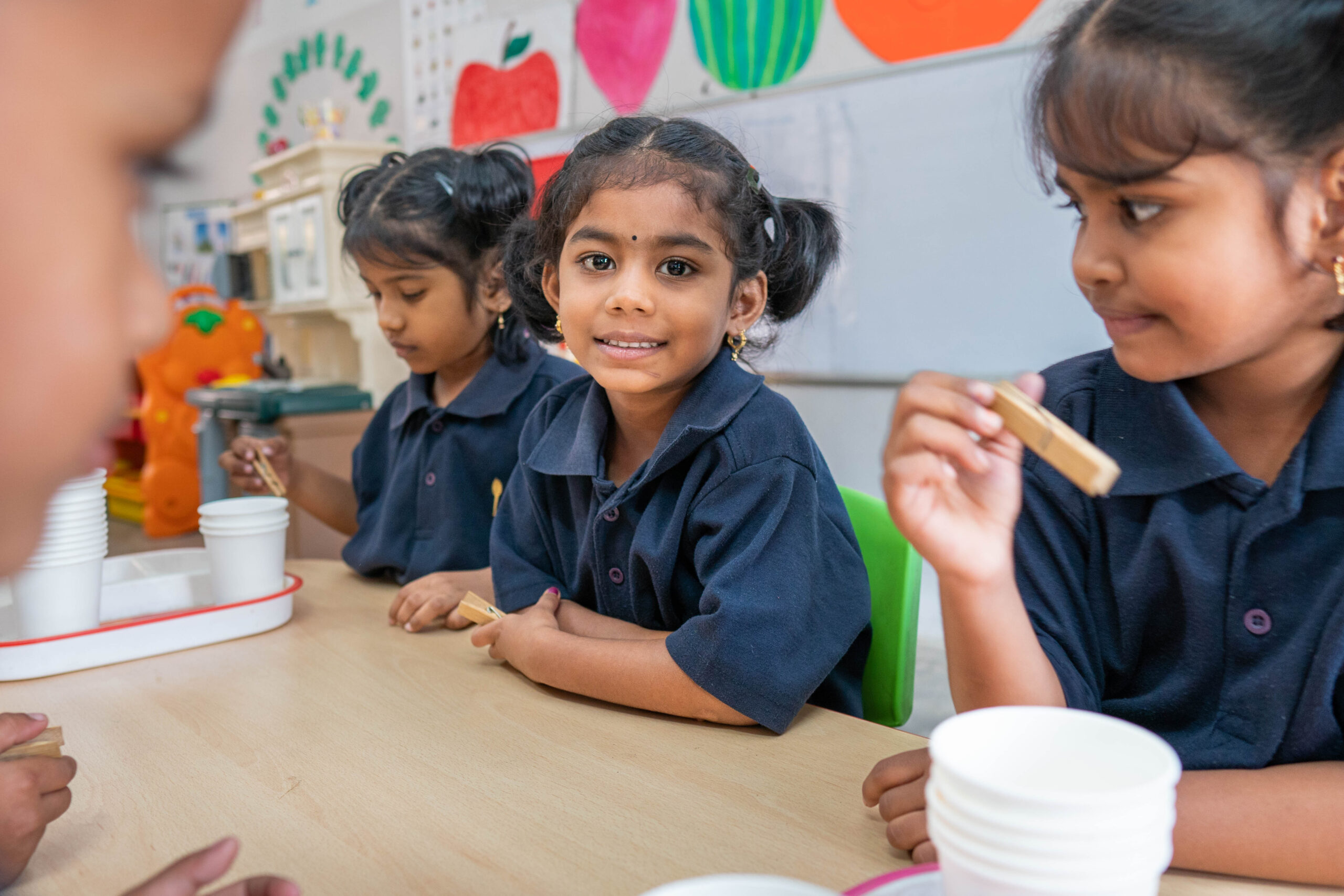 Girls in classroom craft activity at Miriam School