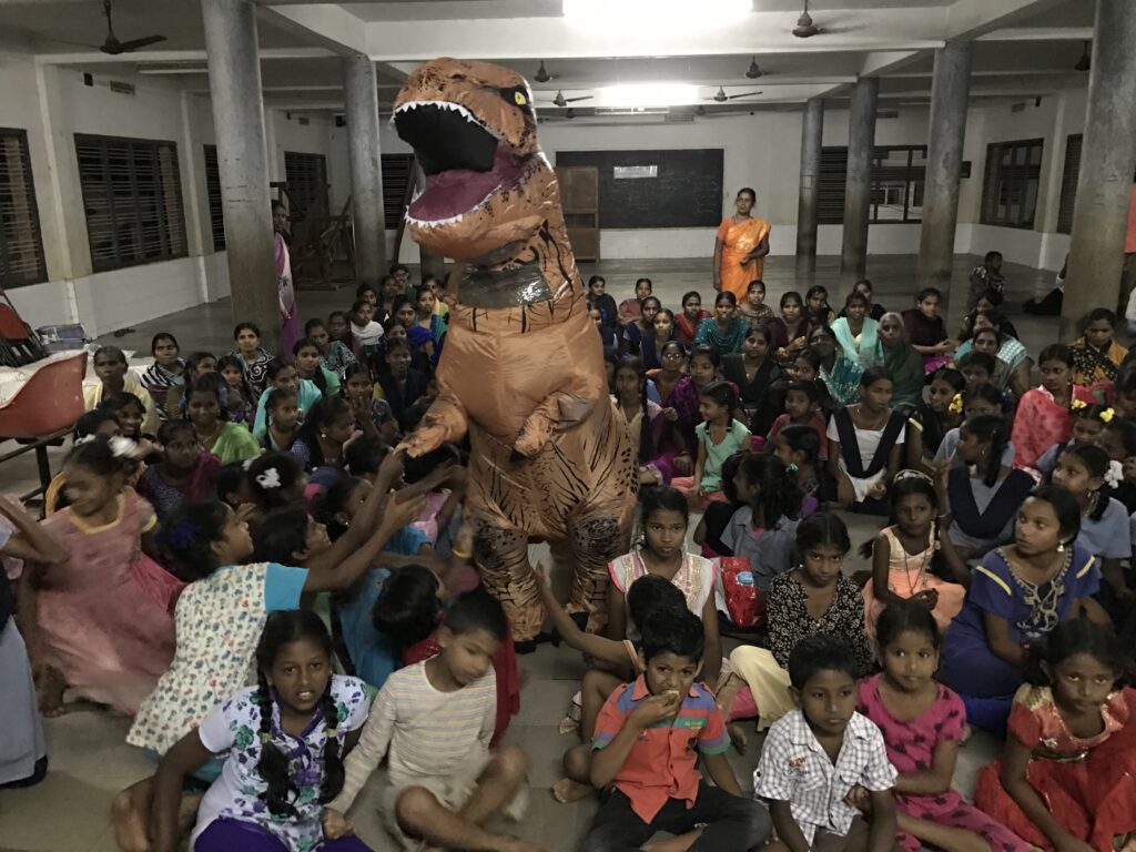 Children enjoying a fun moment during a Hand in Hand trip